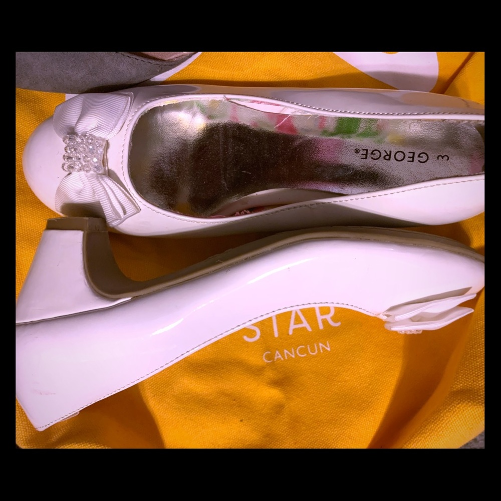 white patent leather shoes with white bow on top